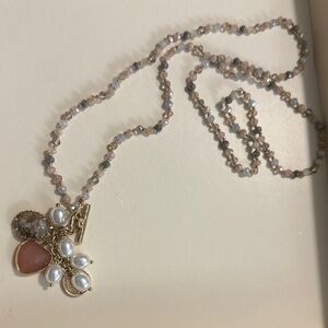Elegant Beaded Necklace with Charms